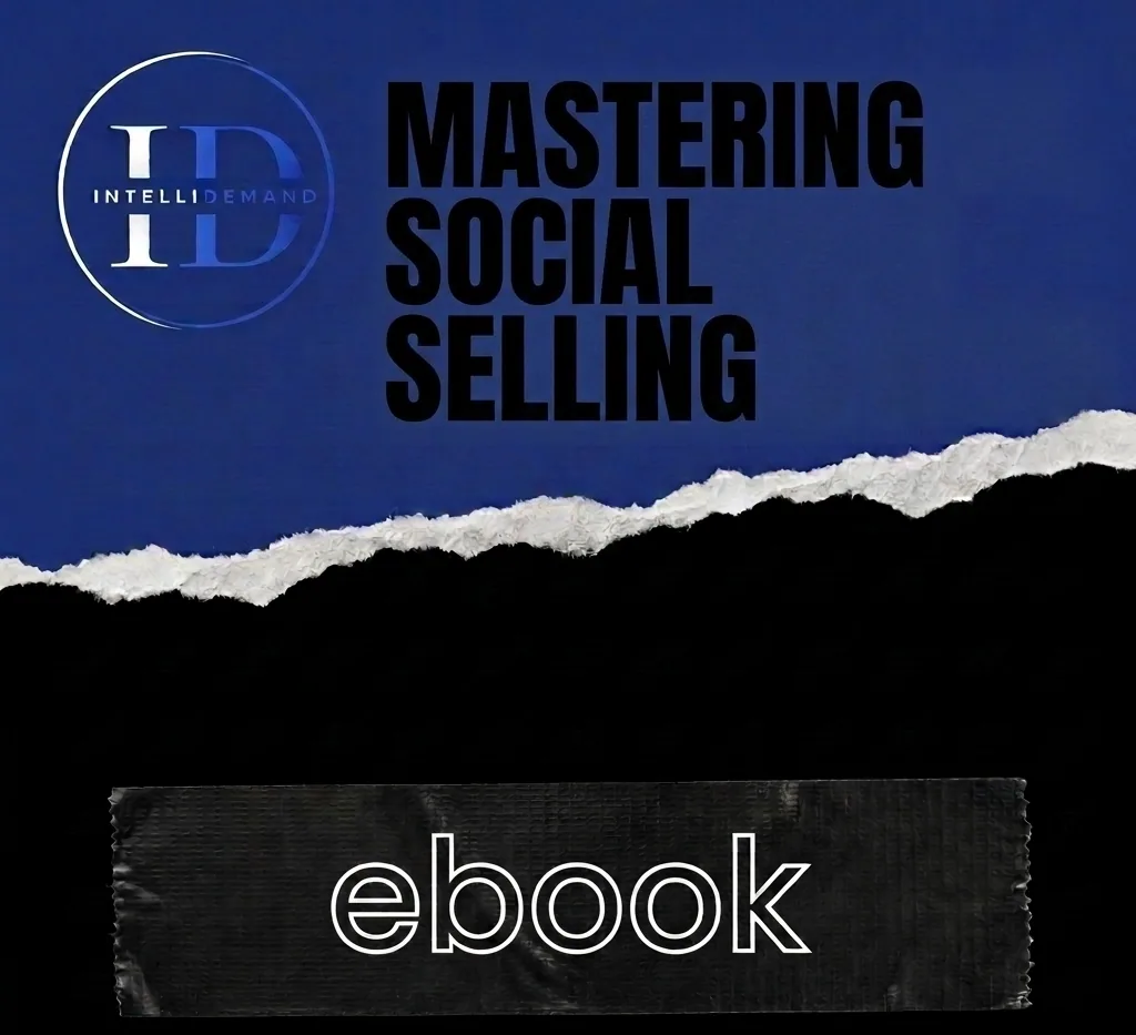 Mastering Social Selling ebook cover – IntelliDemand logo and bold black title on a blue torn-paper background above an “ebook” tape label
