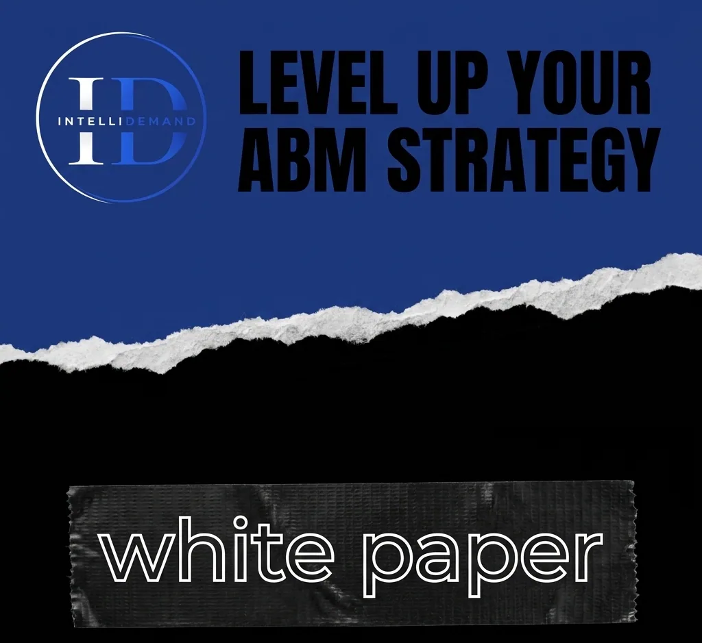 Level Up Your ABM Strategy whitepaper cover – IntelliDemand logo and bold black title on a blue torn-paper background above a “white paper” tape label