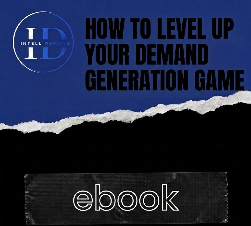 How to Level Up Your Demand Generation Game ebook cover – IntelliDemand logo and bold black title on a blue torn-paper background above an “ebook” tape label